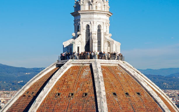 Visitors on the terrace of Florence's Duomo, part of the Florence Art Pass tour.