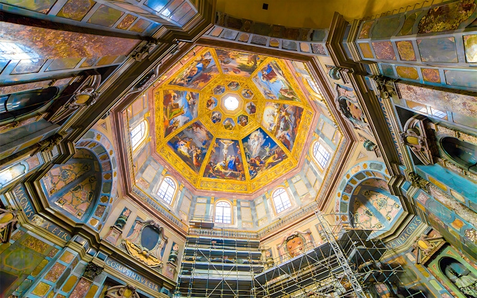 Interior view of Medici Chapel's ornate ceiling with frescoes, Florence, Italy.
