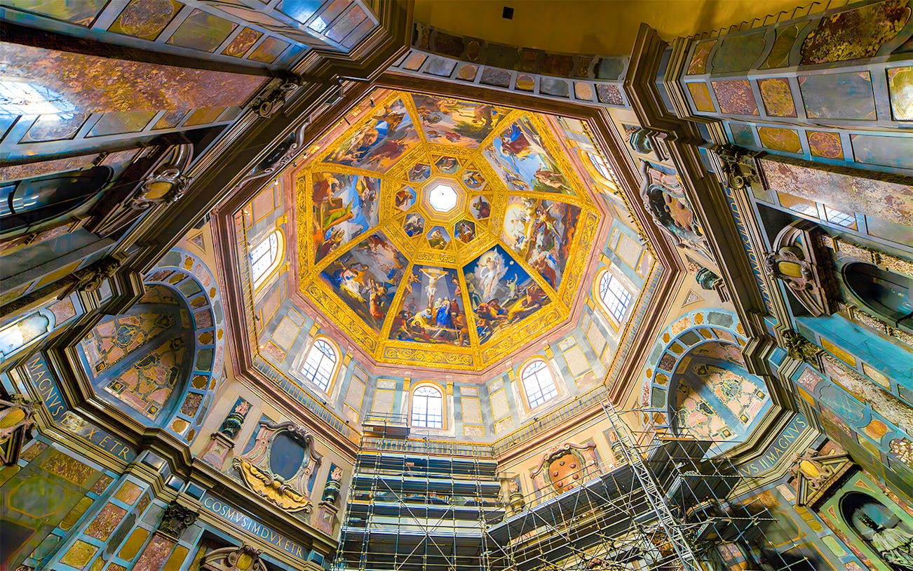 Interior view of Medici Chapel's ornate ceiling with frescoes, Florence, Italy.