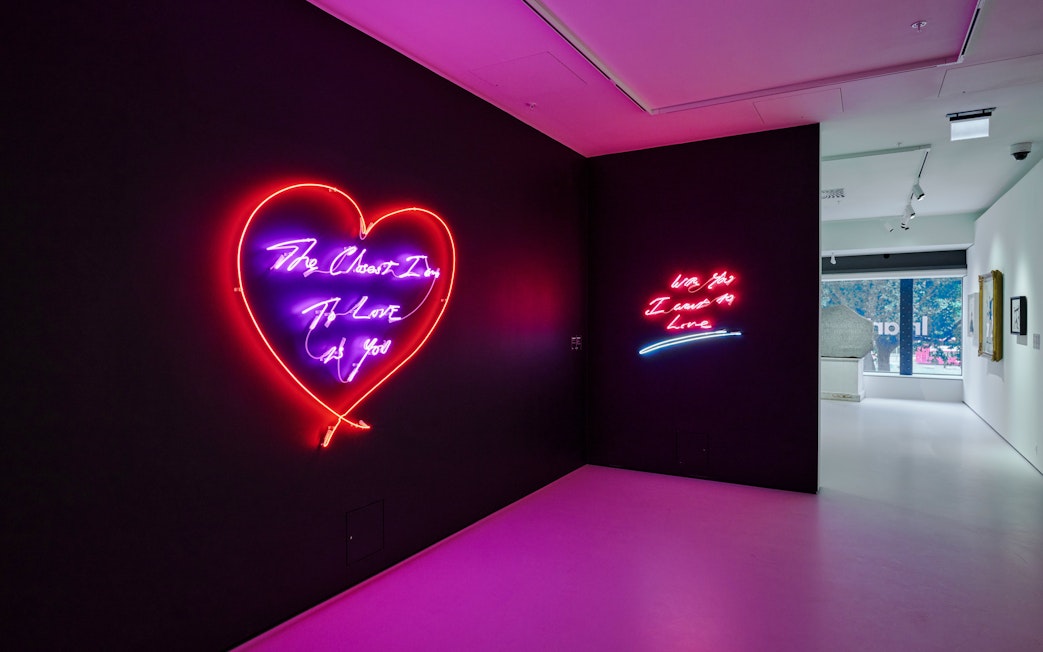 Neon heart art installation at Moco Museum London exhibit.