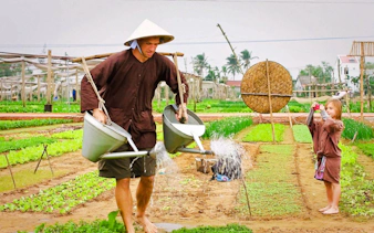 hoi an countryside bicycle tour with tra que vegetable village farming experience and lunch-8
