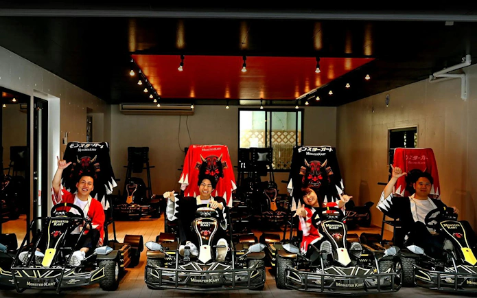 Participants in themed costumes ready for Asakusa electric go-kart tour.