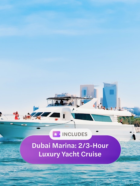 Luxury yacht cruising near Dubai Harbour with city skyline in background.