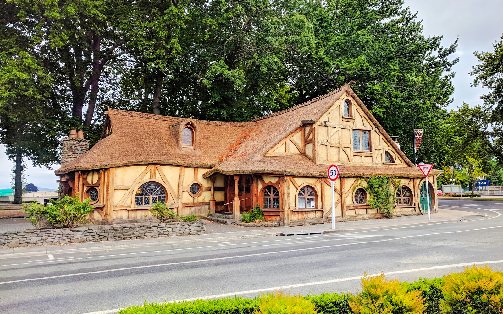 Matamata i-SITE Visitor Information Centre with thatched roof and rustic design, Waikato.
