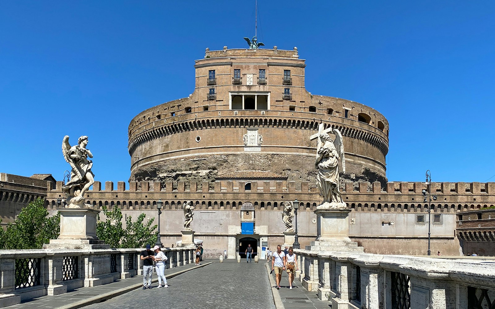 Castel Sant'Angelo entrance with statues on Ponte Sant'Angelo, Rome.