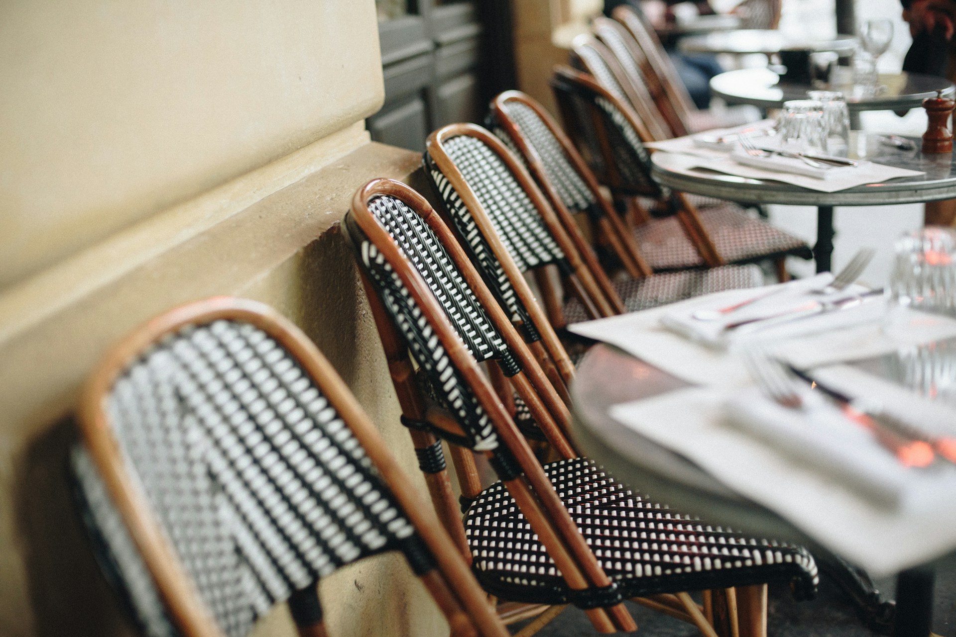 Paris france outdoor cafe chairs and tables