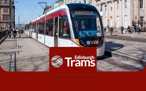 Edinburgh tram at a city stop, offering one-way tickets to/from Edinburgh Airport.