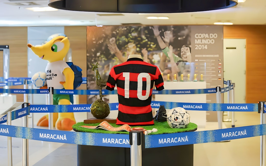 Jersey display with number 10 at Maracanã Stadium, Brazil, featuring World Cup memorabilia.