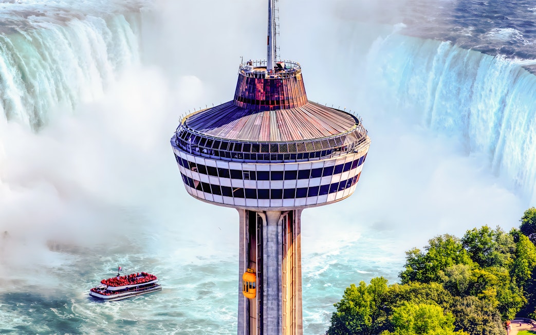 Skylon Tower observation deck overlooking Niagara Falls with cityscape, Canada.
