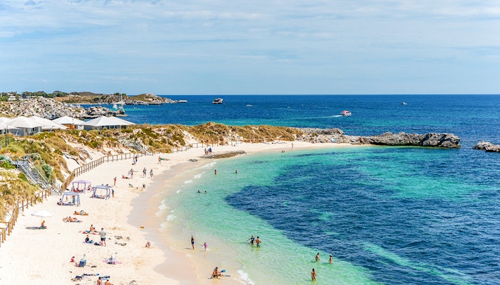 People enjoying the sun and sea at Pinky Beach, Rottnest Island.