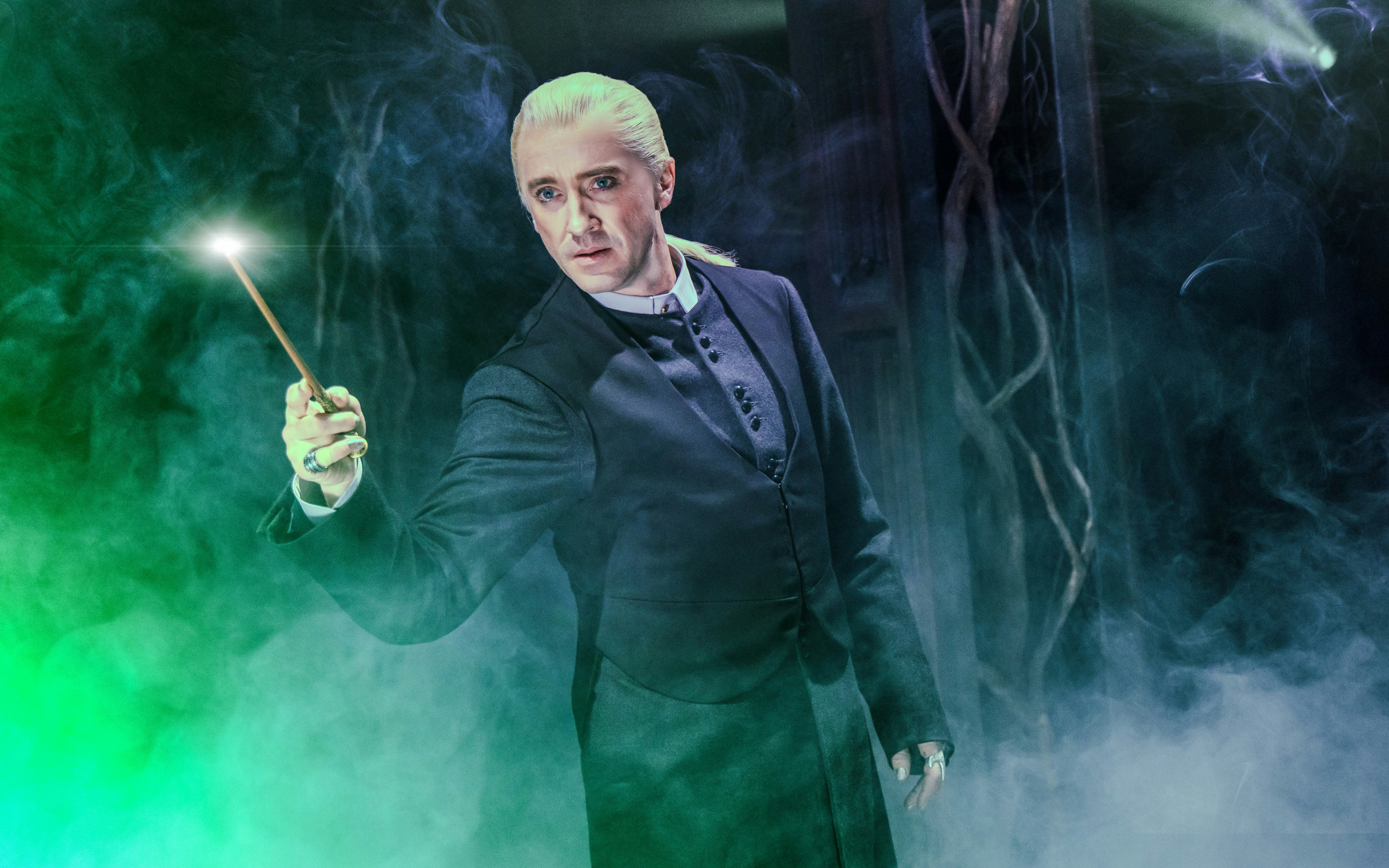 Performer with wand in Harry Potter and the Cursed Child, Broadway stage.