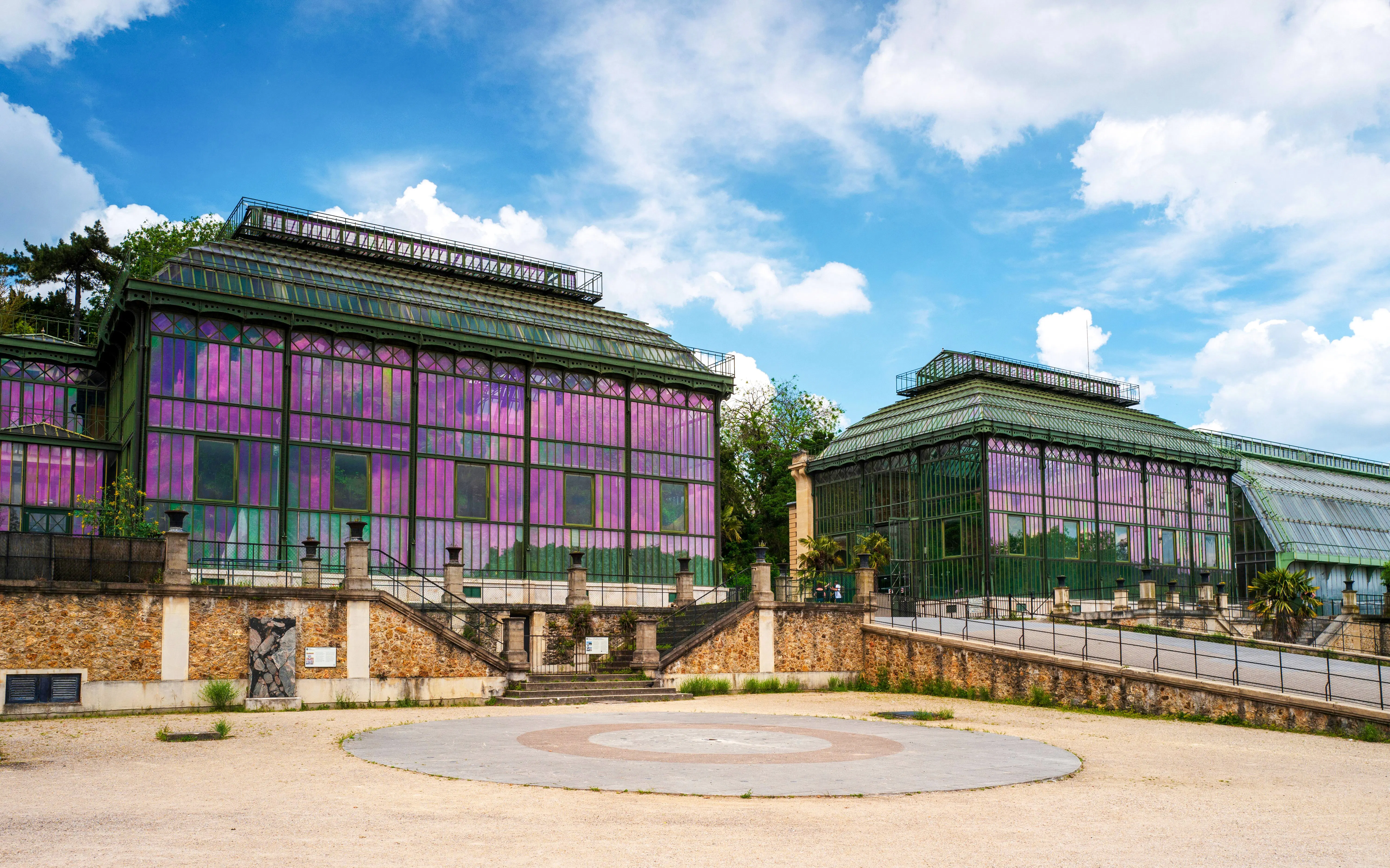 Reflections on greenhouse glass at Jardin des Plantes, Paris, France.