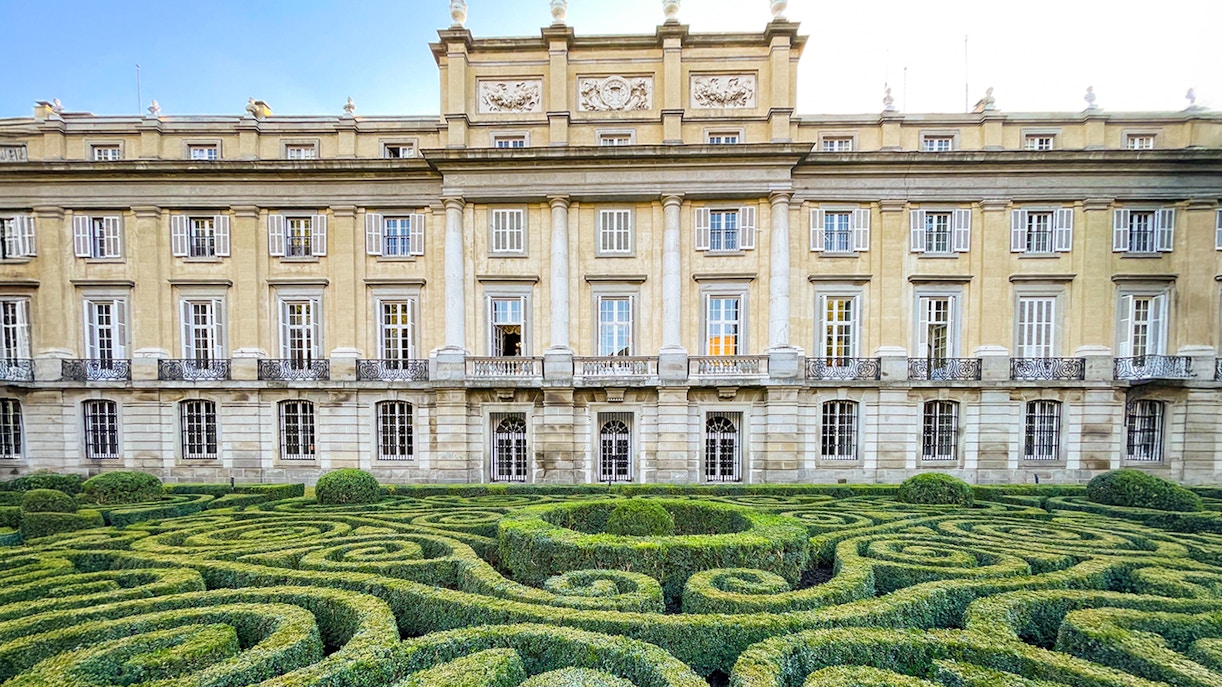 Liria Palace exterior with lush garden in Madrid, Spain.