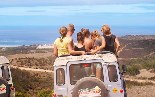 Tourists in a jeep exploring Vicentina Coast & Southwest Alentejo Natural Park.