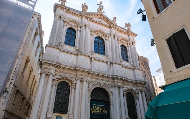 Scuola Grande di San Teodoro facade in Venice, Italy, showcasing ornate architecture.