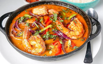 Shrimp moqueca dish prepared in Brazilian cooking class, Copacabana, Rio de Janeiro.