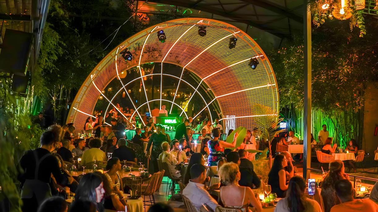 Performer entertaining guests at Nouba Restaurant Dinner Show.