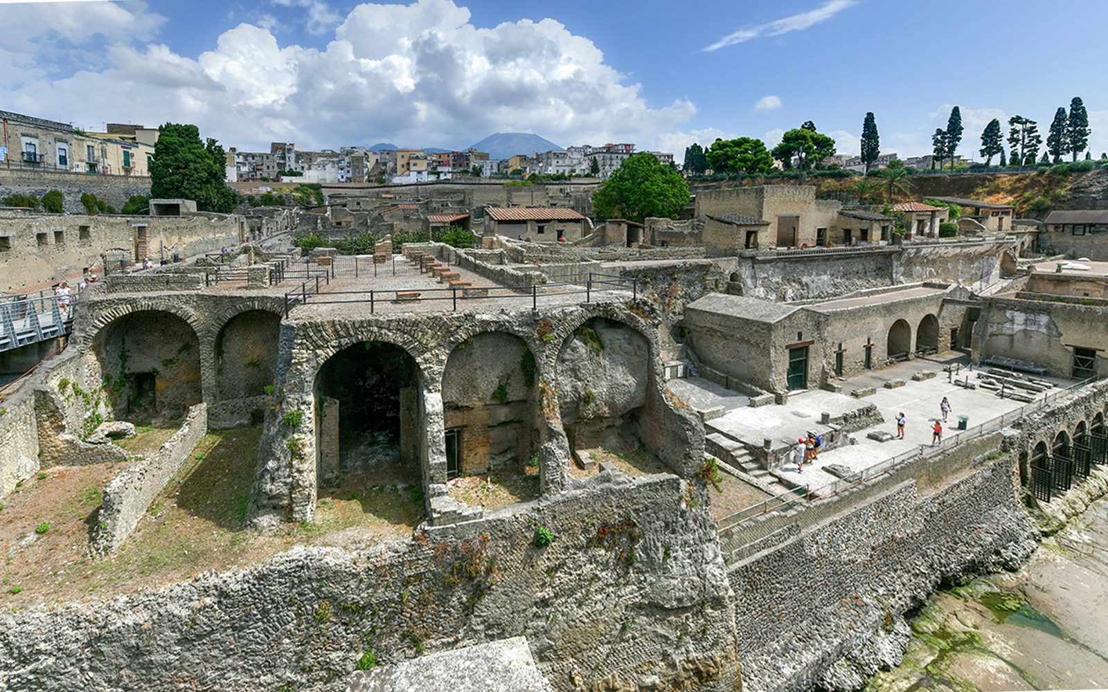 Herculaneum Ruins with ancient stone arches and preserved structures in Italy.