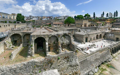 Herculaneum Ruins with ancient stone arches and preserved structures in Italy.
