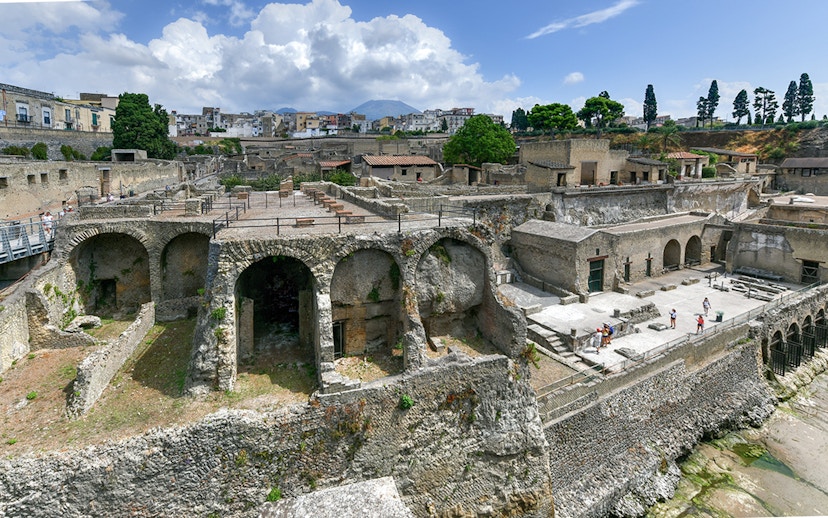 Herculaneum Ruins with ancient stone arches and preserved structures in Italy.