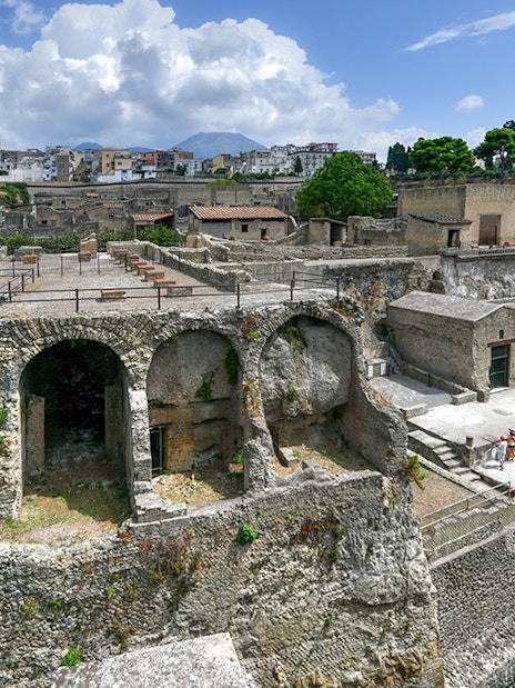 Herculaneum Ruins with ancient stone arches and preserved structures in Italy.