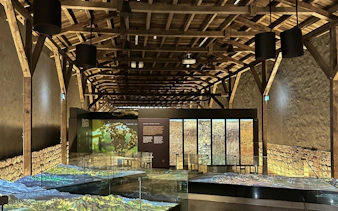 Exhibit room at Viña Concha y Toro wine center in Santiago, Chile displaying vineyard projections.