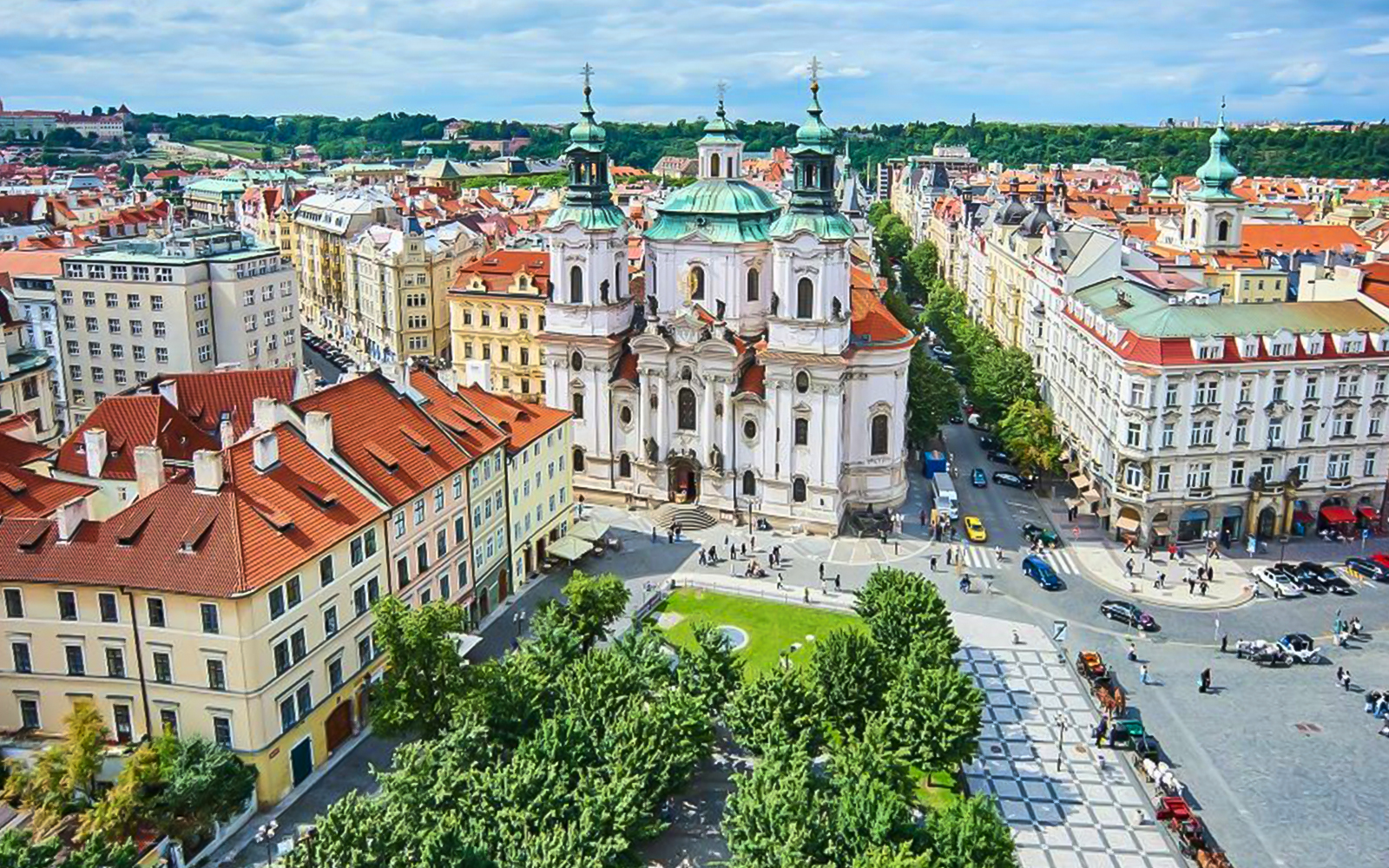 Aerial view of St. Nicholas Church and surrounding buildings in Prague's Jewish Quarters.