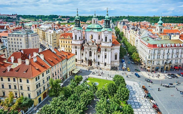 Aerial view of St. Nicholas Church and surrounding buildings in Prague's Jewish Quarters.