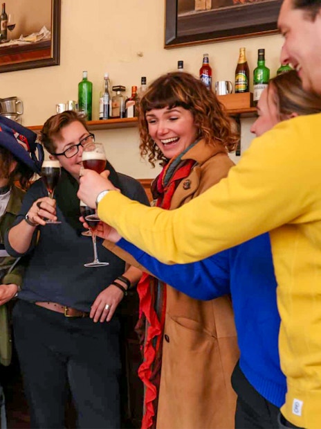 Group enjoying drinks on Eating London: Heart of 'The City' Food Tour.
