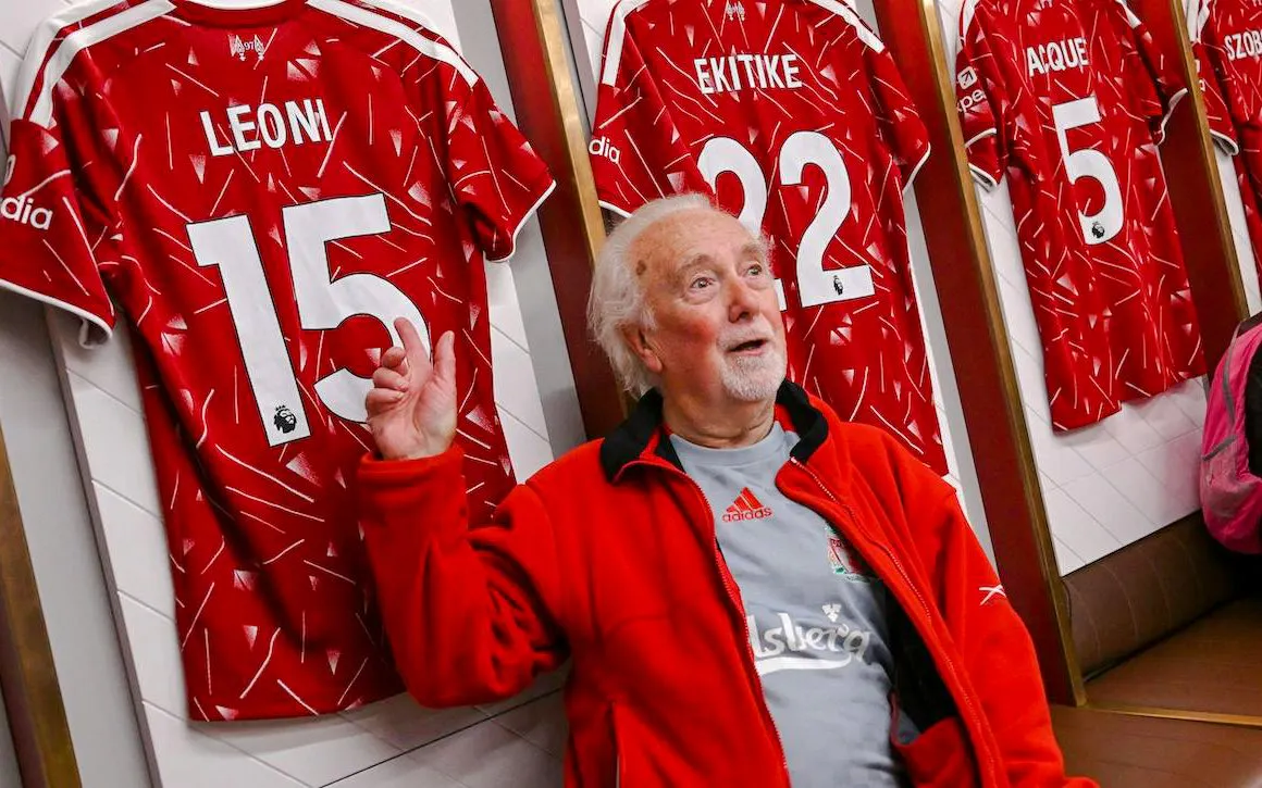 Liverpool FC museum interior with jerseys on display at Anfield stadium tour.