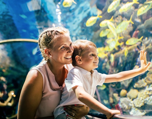 Mother and son at an aquarium