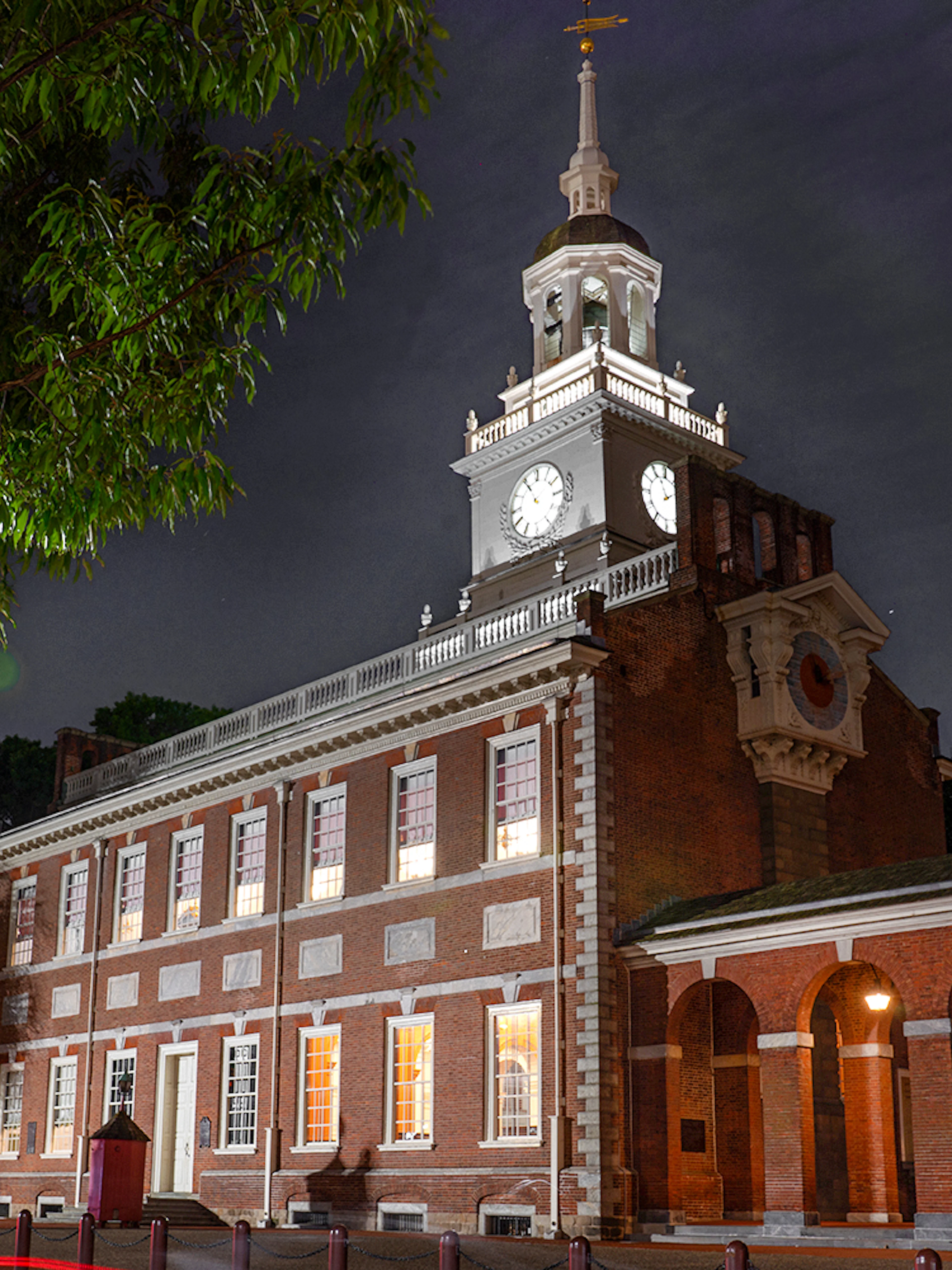 Independence Hall illuminated at night during a Philadelphia tour.
