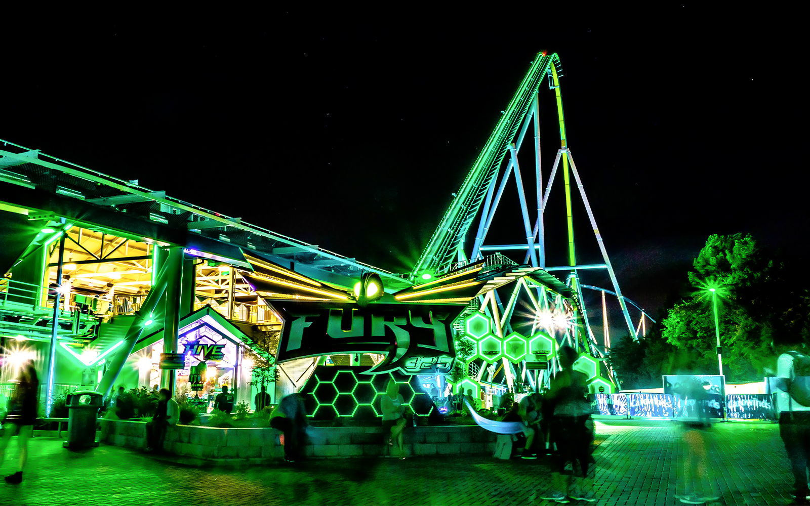 Fury 325 roller coaster at Six Flags Carowinds illuminated at night.