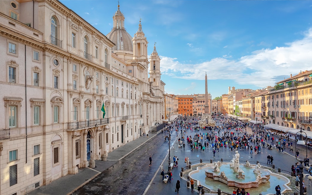 Piazza Navona in Rome with Fountain of the Four Rivers and surrounding architecture.