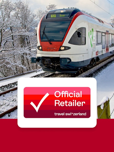 Train traveling through snowy Swiss landscape with Swiss Travel Pass logo.