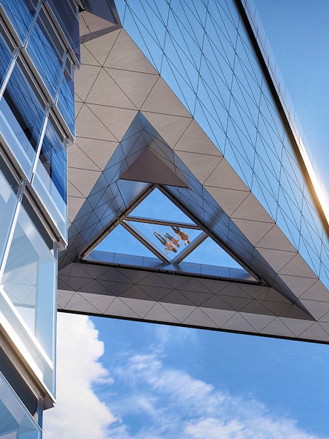 Edge Observation Deck glass floor view with sky and building reflections.