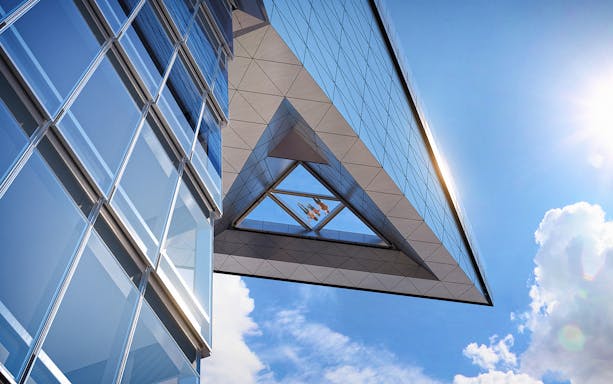 Edge Observation Deck glass floor view with sky and building reflections.