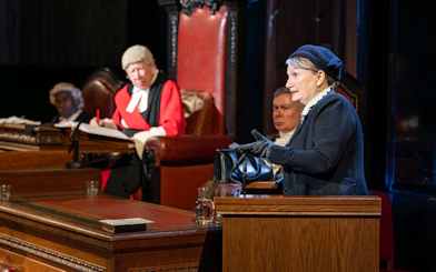 Courtroom scene from "Witness for the Prosecution" performance with actors in period costumes.
