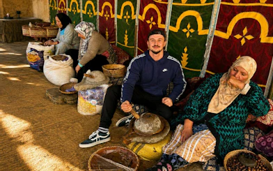 Local artisans grinding argan oil in Ourika Valley, Marrakech.