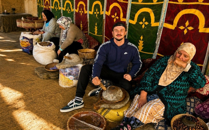 Local artisans grinding argan oil in Ourika Valley, Marrakech.