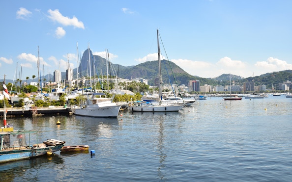 Port with sailboats and Sugarloaf Mountain in Rio de Janeiro.