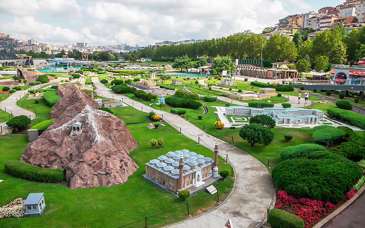 Guests exploring miniature landmarks at Istanbul Miniatürk park.