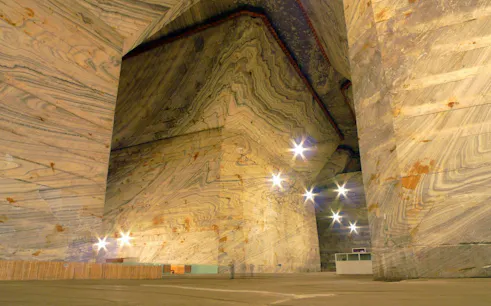 Slanic Prahova Salt Mine interior with illuminated salt walls, Bucharest day trip.