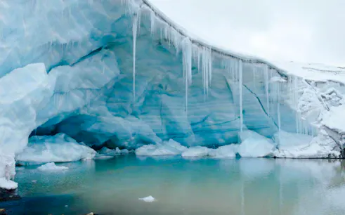 Quelccaya Glacier ice formations and lake view on Cusco day tour.
