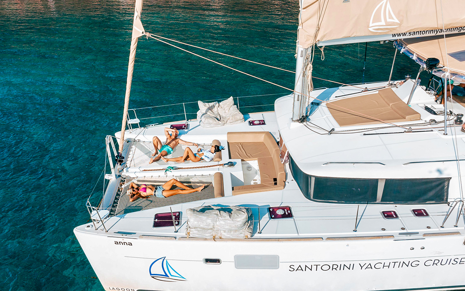 Daytime or Sunset Santorini Catamaran Cruise with Meal, Drinks & Transfers