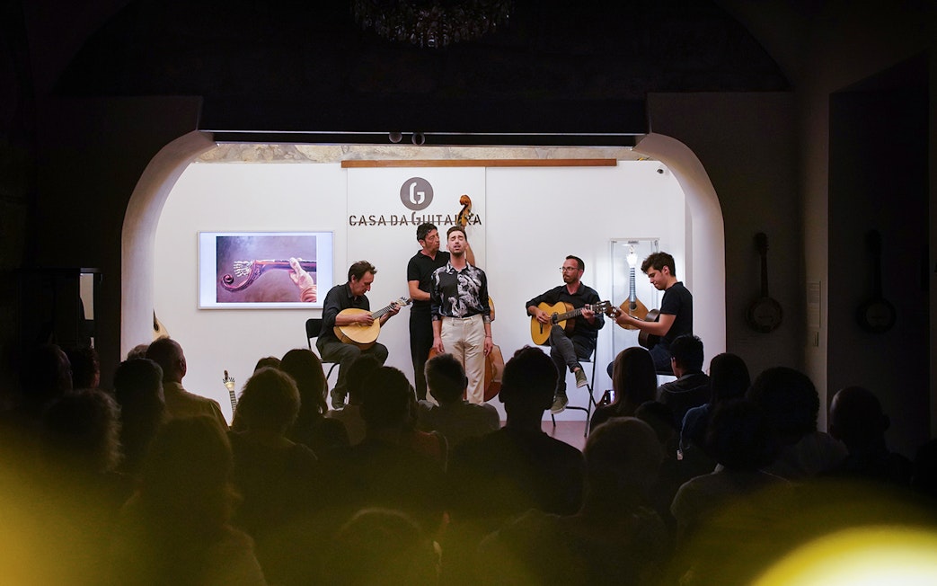 Musicians performing at Casa da Guitarra with Pedro Ferreira in Porto, Portugal.