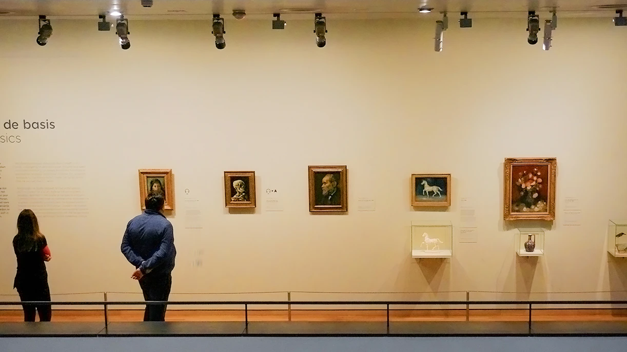 Visitors viewing paintings at the Van Gogh Museum in Amsterdam.