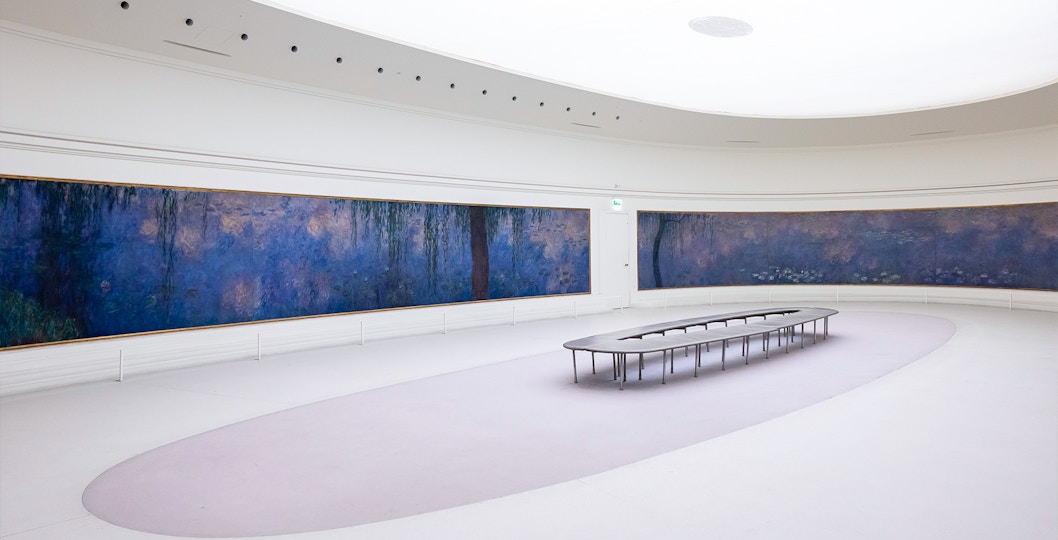 Claude Monet's water lilies painting displayed in Orangerie Museum, Paris, France.