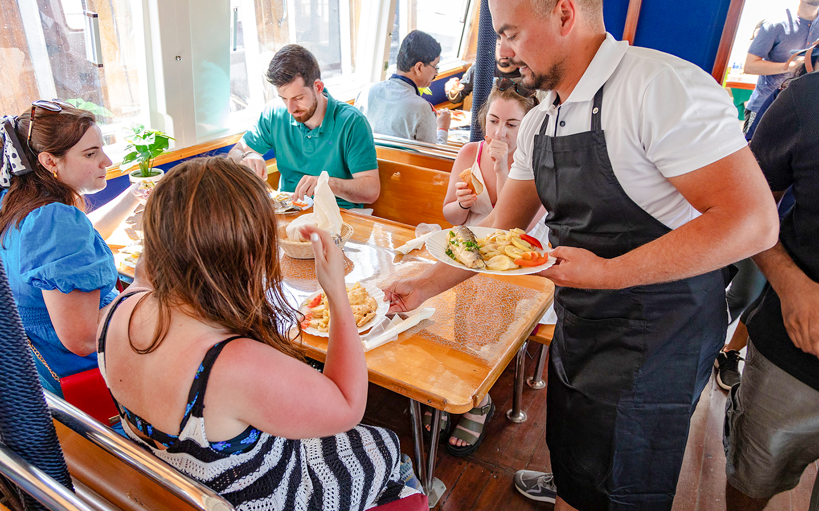 Guests dining onboard Elaphite Island Cruise, Dubrovnik.