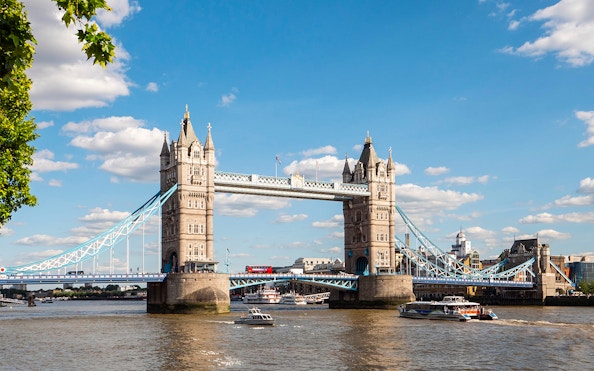 Tower Bridge viewed from a sightseeing cruise on the River Thames.
